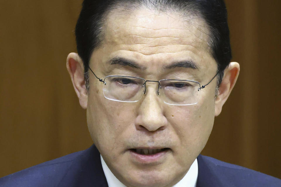 Japan's Prime Minister Fumio Kishida speaks during a political ethics committee at parliament in Tokyo Thursday, Feb. 29, 2024. (Japan Pool/Kyodo News via AP)