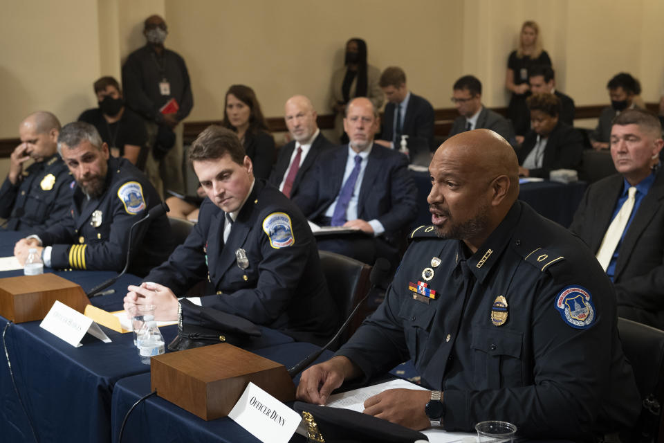 Aquilino Gonell, sergeant of the U.S. Capitol Police,, Michael Fanone, officer for the Metropolitan Police Department, and Daniel Hodges, officer for the Metropolitan Police Department, listen while Harry Dunn, private first class of the U.S. Capitol Police, testifies during a hearing of the House select committee investigating the January 6 attack on the U.S. Capitol on July 27, 2021 at the Canon House Office Building in Washington, DC. (Brendan Smialowski-Pool/Getty Images)