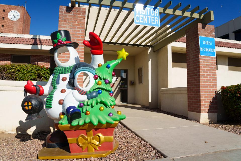 The entrance to the visitor center in downtown Buckeye, Ariz., features holiday decor on Dec. 23, 2022.