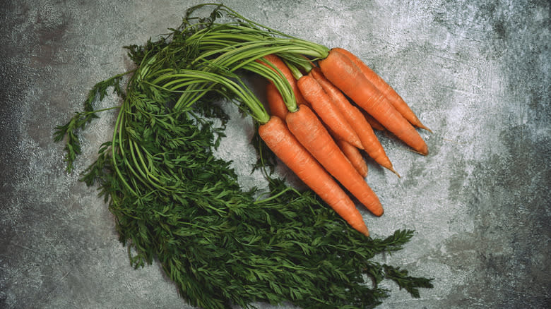 raw carrots bunch stems