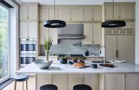 <p>In the <a href="https://www.elledecor.com/design-decorate/house-interiors/g25349315/inside-renovated-spec-home-with-an-understated-elegance/" rel="nofollow noopener" target="_blank" data-ylk="slk:kitchen of this renovated spec home;elm:context_link;itc:0;sec:content-canvas" class="link ">kitchen of this renovated spec home</a>, natural light complements the custom cerused oak kitchen cabinetry with custom brass detailing. Circular pendant lights from Lambert & Fils provide contrast and bring out streaks of black in the marble countertops and backsplash from Marble America in New Rochelle, New York. The stools were sourced from CB2, and the appliances, Wolf.</p>