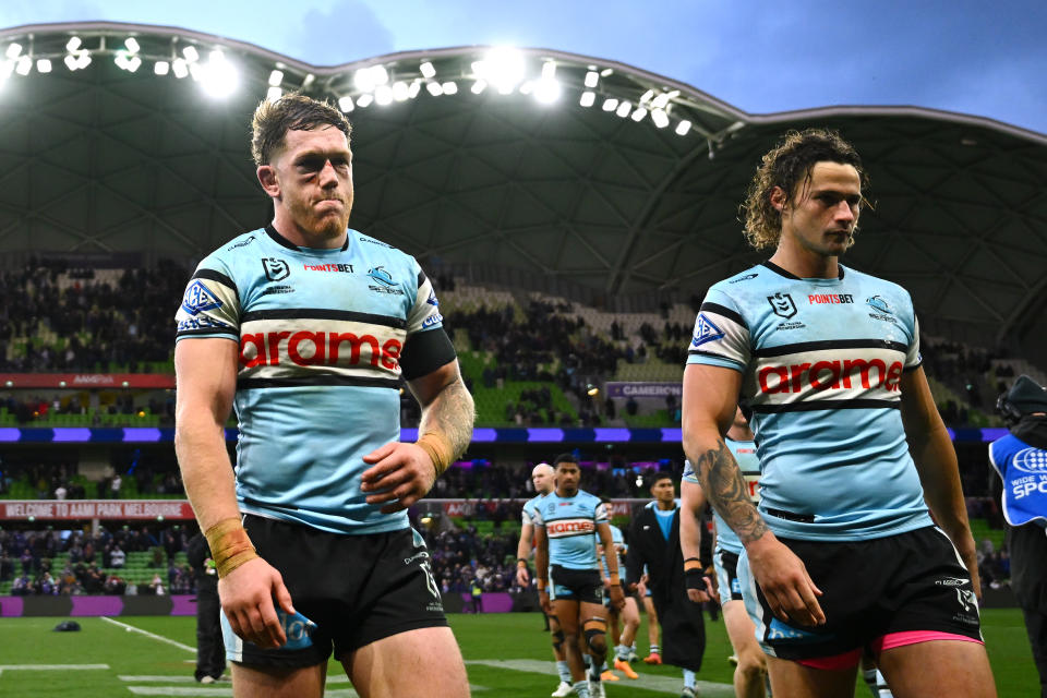 MELBOURNE, AUSTRALIA - SEPTEMBER 14:  Cameron McInnes and Nicho Hynes of the Sharks walk off the field after losing the NRL Qualifying Final match between Melbourne Storm and Cronulla Sharks at AAMI Park on September 14, 2024 in Melbourne, Australia. (Photo by Quinn Rooney/Getty Images)