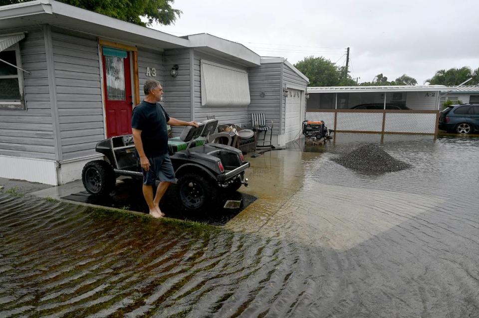 Roger Huffman’s home in Bradenton’s Villa Del Sol Mobile Home Park is without power and surrounded by water on Monday, Aug. 5, 2024, after Hurricane Debby soaked Manatee County.