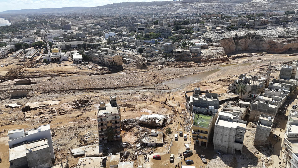 A general view of the flooded city of Derna, Libya, is seen Wednesday, Sept. 13, 2023. The rainwater that gushed down Derna's mountainside and into the city has killed thousands and left thousands more missing, washing entire neighborhoods out to sea. AP Photo/Muhammad J. Elalwany)