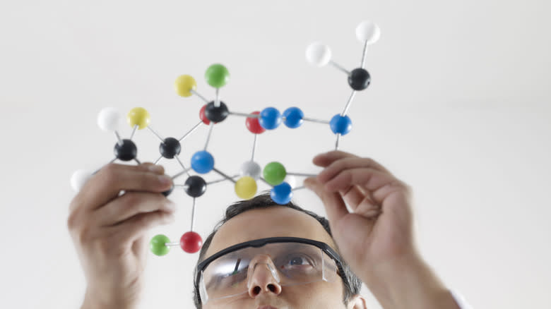 Scientist looking at molecules