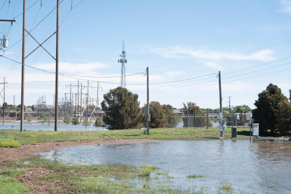 Excess water from McDonald Lake in Amarillo flooded the surrounding area from Friday's rains.