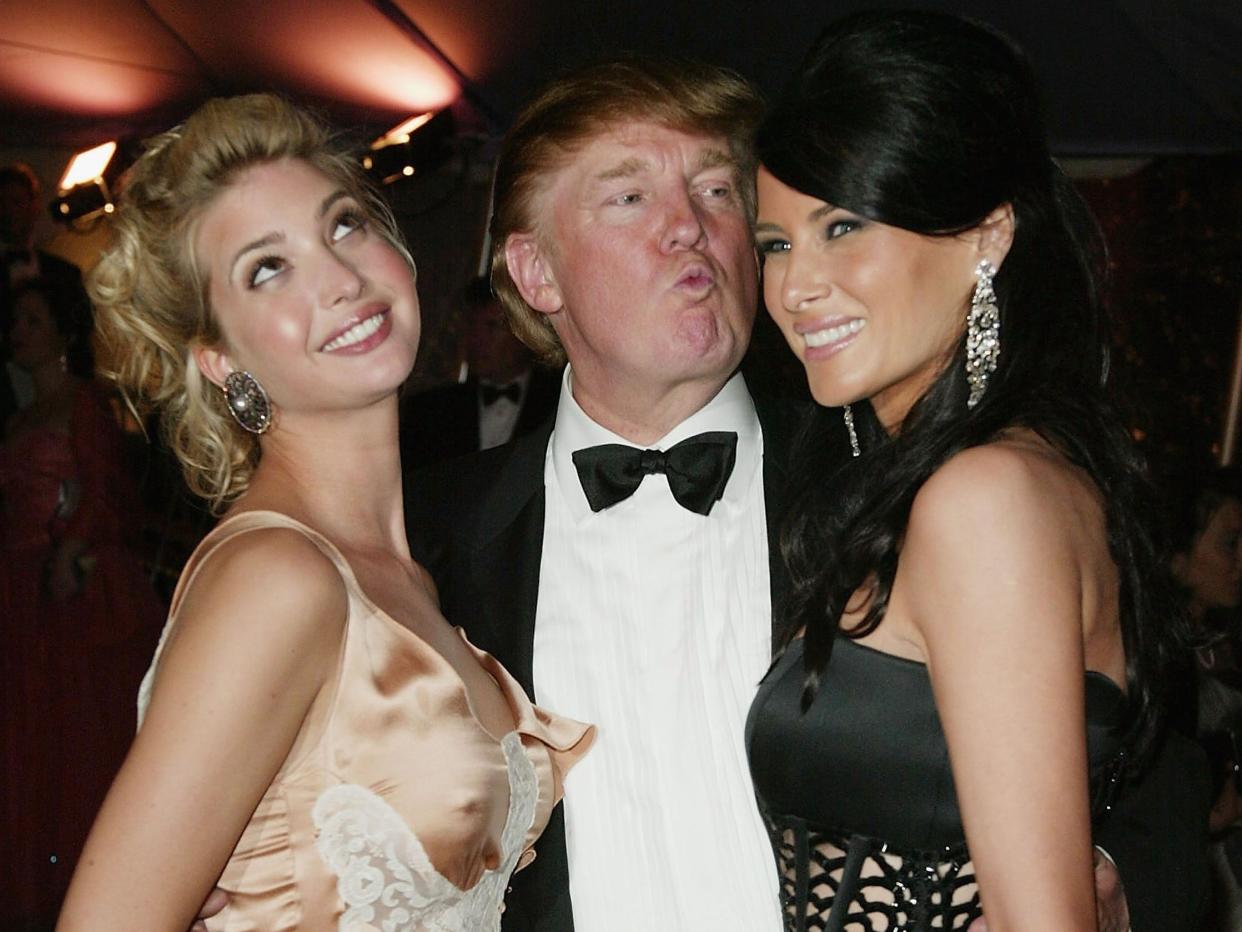 Ivanka Trump, Donald Trump, and Melania Trump at the Met Gala in 2004.