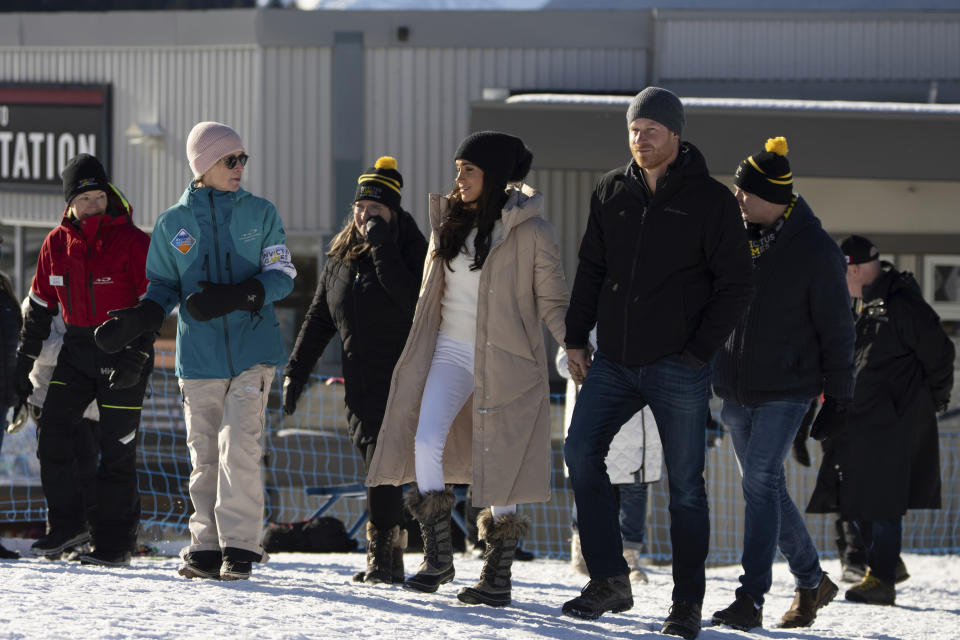Meghan Markle and Prince Harry The Duchess and Duke of Sussex, attend the Invictus Games training camp in Whistler, Canada, on Wednesday, Feb. 14, 2024. (Ethan Cairns/The Canadian Press via AP)