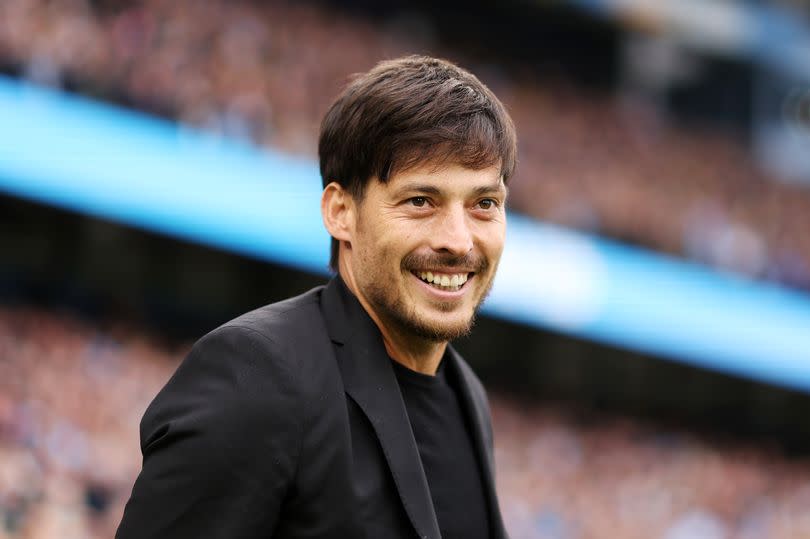 David Silva acknowledges the fans before the Premier League match between Manchester City and Wolves