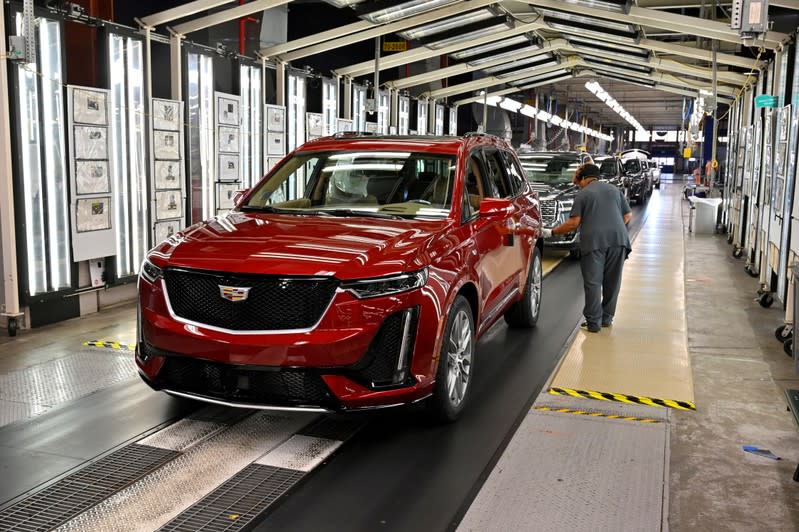 FILE PHOTO: Final inspection is performed as the vehicles are ready to leave the assembly line at the General Motors (GM) manufacturing plant in Spring Hill