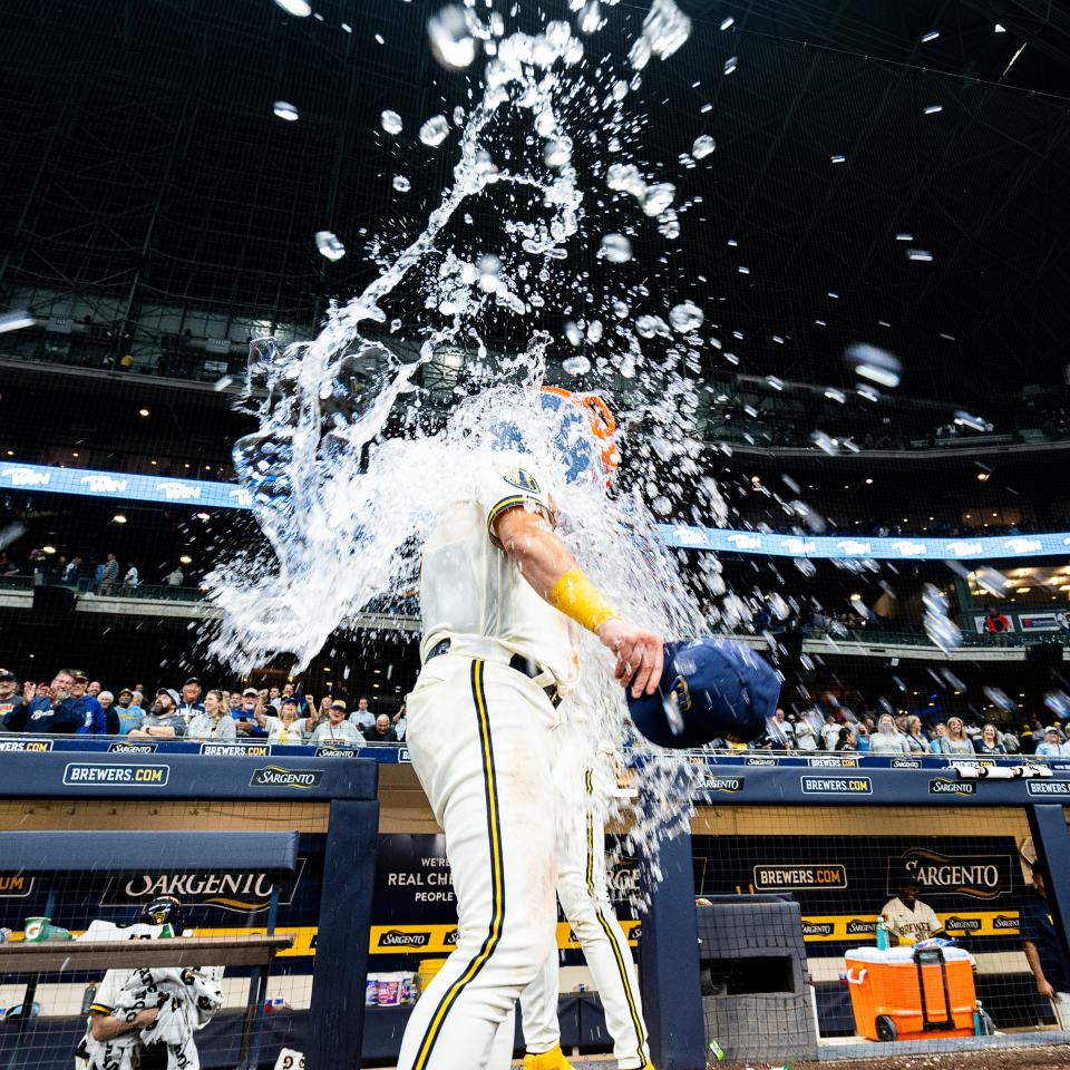Milwaukee Brewers shortstop Willy Adames (27) dunks Gatorade on Milwaukee designated hitter Josh Donaldson (3) at the end of the game against the Miami Marlins on Tuesday September 12, 2023 at American Family Field in Milwaukee, Wis.