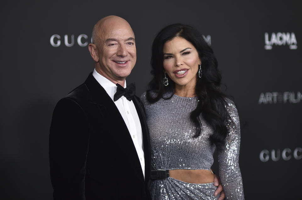 Jeff Bezos, left, and Lauren Sanchez arrive at the LACMA Art + Film Gala on Saturday, Nov. 6, 2021, at the Los Angeles County Museum of Art in Los Angeles. (Photo by Richard Shotwell/Invision/AP)