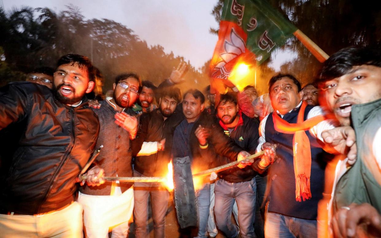 Protests against the Kerala state government for allowing women to enter a temple spread across the country - REUTERS