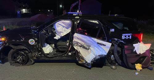 A 30-year-old Taunton woman was charged with drunk driving after allegedly crossing into oncoming traffic and hitting this Dighton police cruiser at Route 44 and Burt Street in Taunton on the night of Monday, Oct. 9, 2023. The Dighton police officer and the driver who was charged were both taken to the hospital, treated and released.
