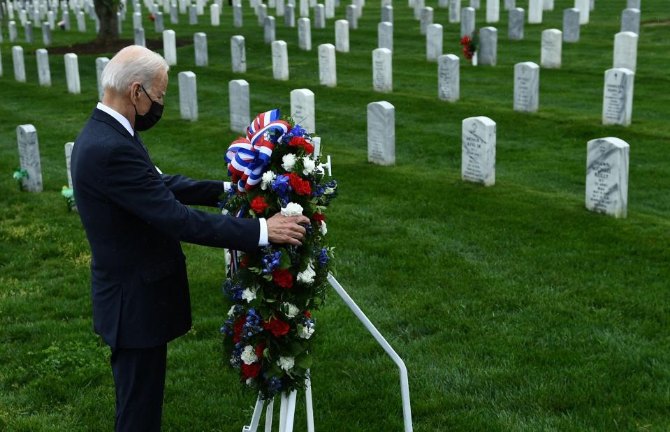 President Joe Biden honors fallen veterans of the Afghan war at Arlington National Cemetery in Arlington, Va. on April 14, 2021.