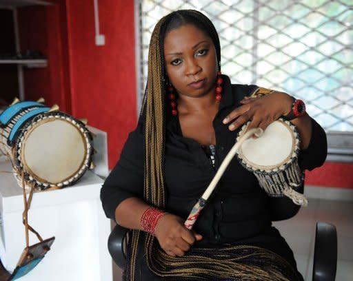 Talking drummer Aralola Olamuyiwa, popularly known as Ara, plays the talking drum during a rehearsal in Lagoson. The talking drum is a long way from dying, having now been incorporated into not only traditional music, but also African hip-hop and the songs of global stars such as Erykah Badu