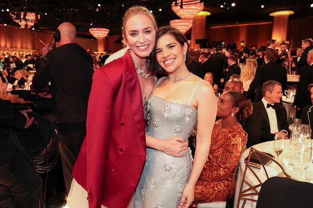 <p>Christopher Polk/Golden Globes 2024/Golden Globes 2024 via Getty </p> Emily Blunt and America Ferrera