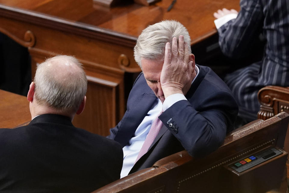 FILE - Rep. Kevin McCarthy, R-Calif., sits after the 13th round of voting for speaker in the House chamber as the House meets for the fourth day to elect a speaker and convene the 118th Congress in Washington, Friday, Jan. 6, 2023. (AP Photo/Andrew Harnik, File)