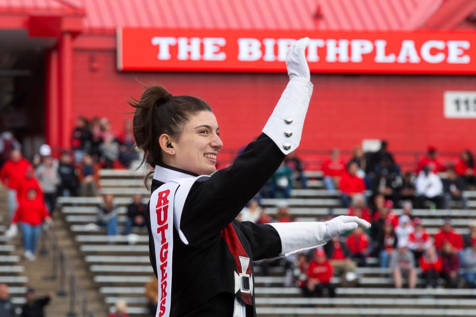 Drum major Amelia Ainbinder leads the Rutgers Marching Scarlet Knights during the pregame performance before the football game against Ohio State at SHI Stadium. The marching band will perform this year in the Macy’s Thanksgiving Day Parade.