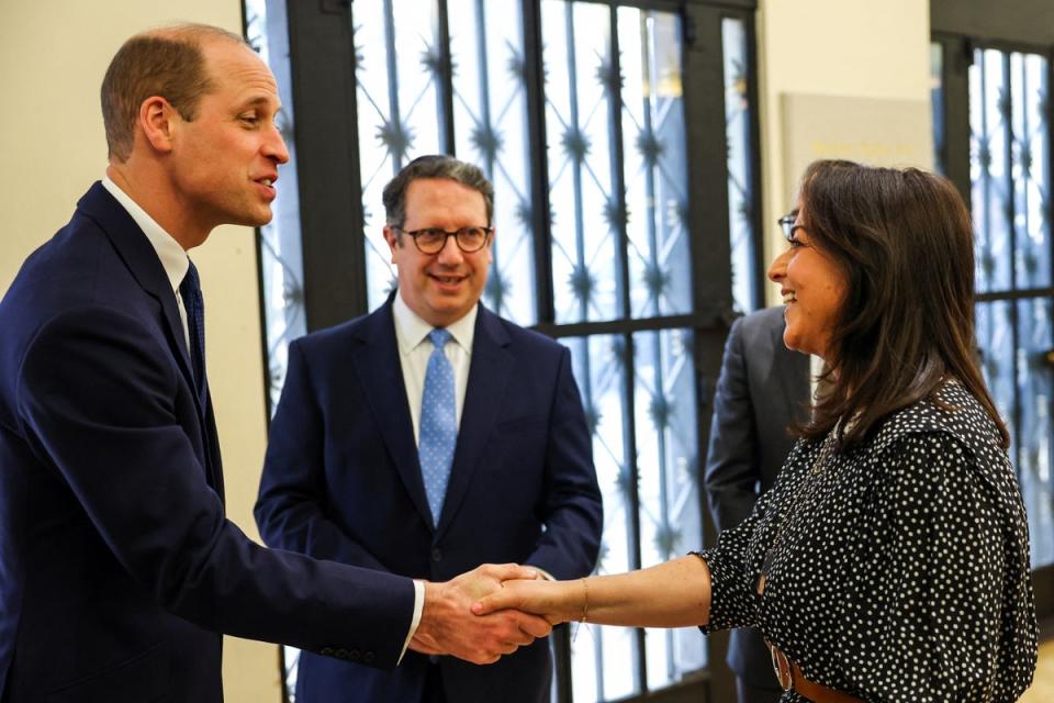 Karen Pollock meets Prince William (Reuters)