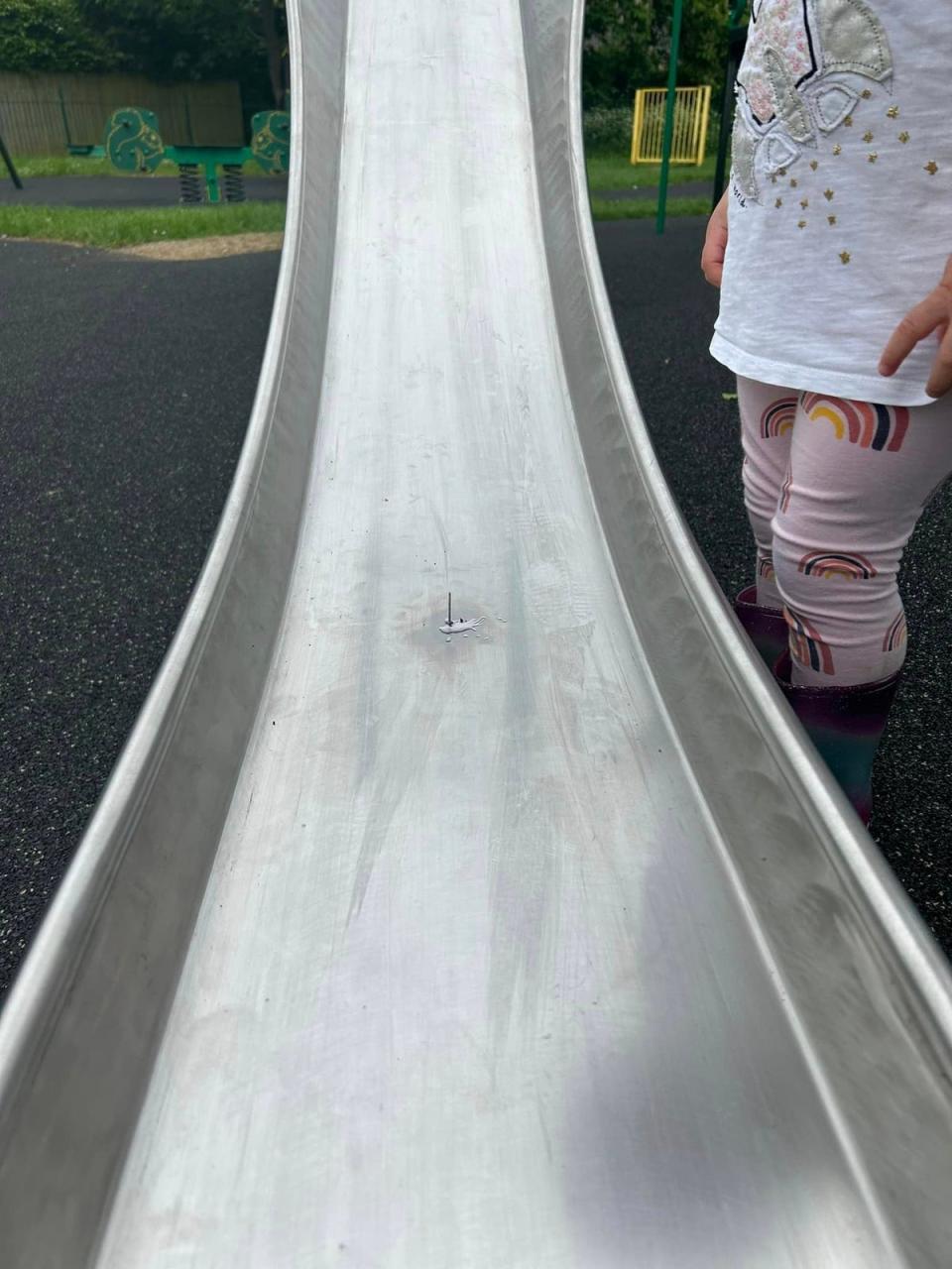 A nail glued to the village slide (Supplied)
