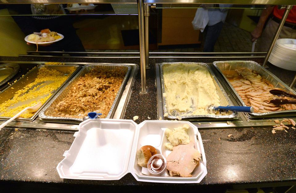 A turkey dinner to go was prepared during the 30th annual Thanksgiving dinner hosted by the Sisters of St. Joseph and held at the dining hall at the Waldron Campus Center at Gannon University in Erie on Nov. 22, 2018. The event celebrates its 35th anniversary this year.