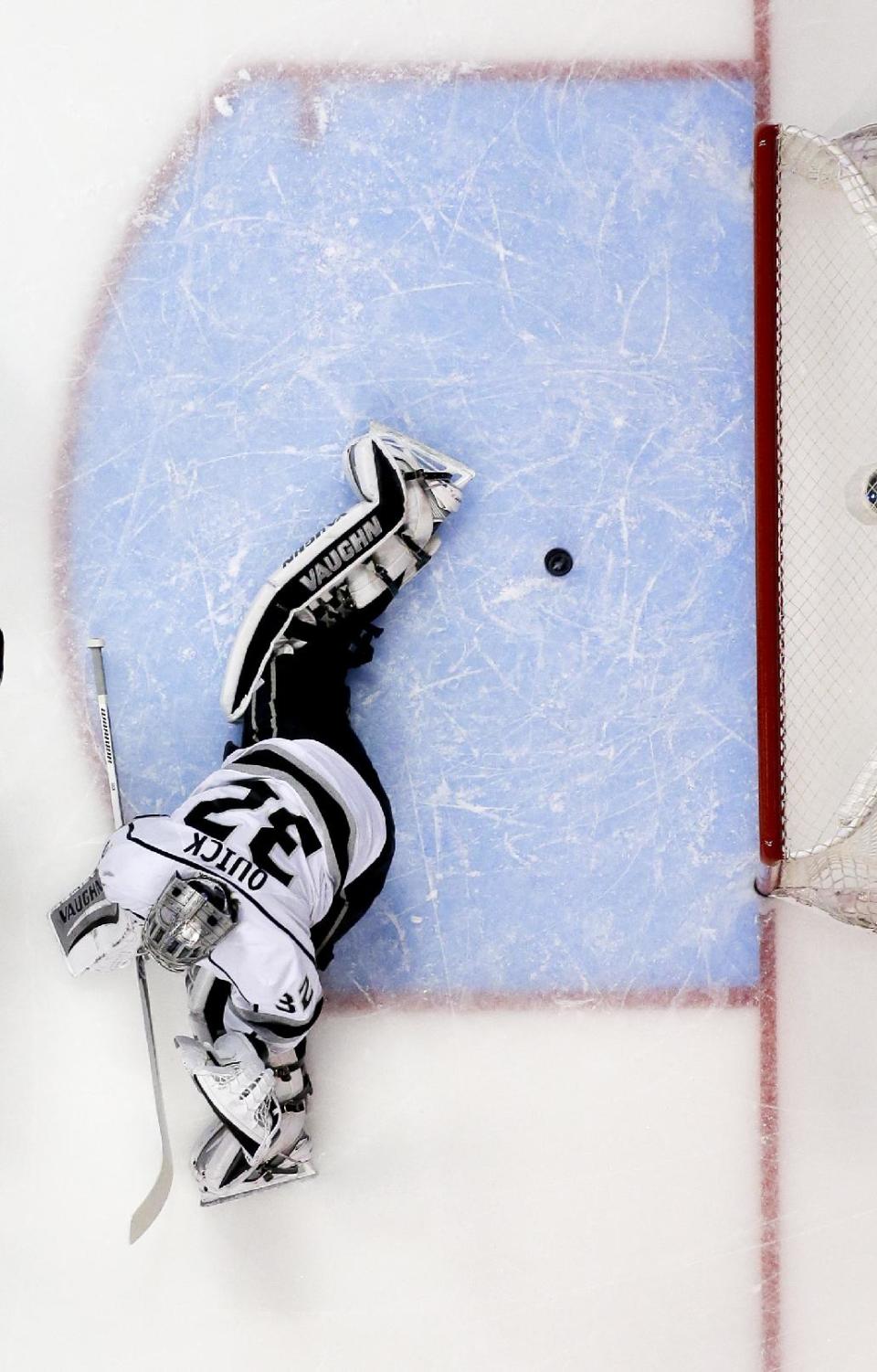 Los Angeles Kings goalie Jonathan Quick fails to stop a goal by Anaheim Ducks center Nick Bonino during the first period in Game 5 of an NHL hockey second-round Stanley Cup playoff series in Anaheim, Calif., Monday, May 12, 2014. (AP Photo/Chris Carlson)