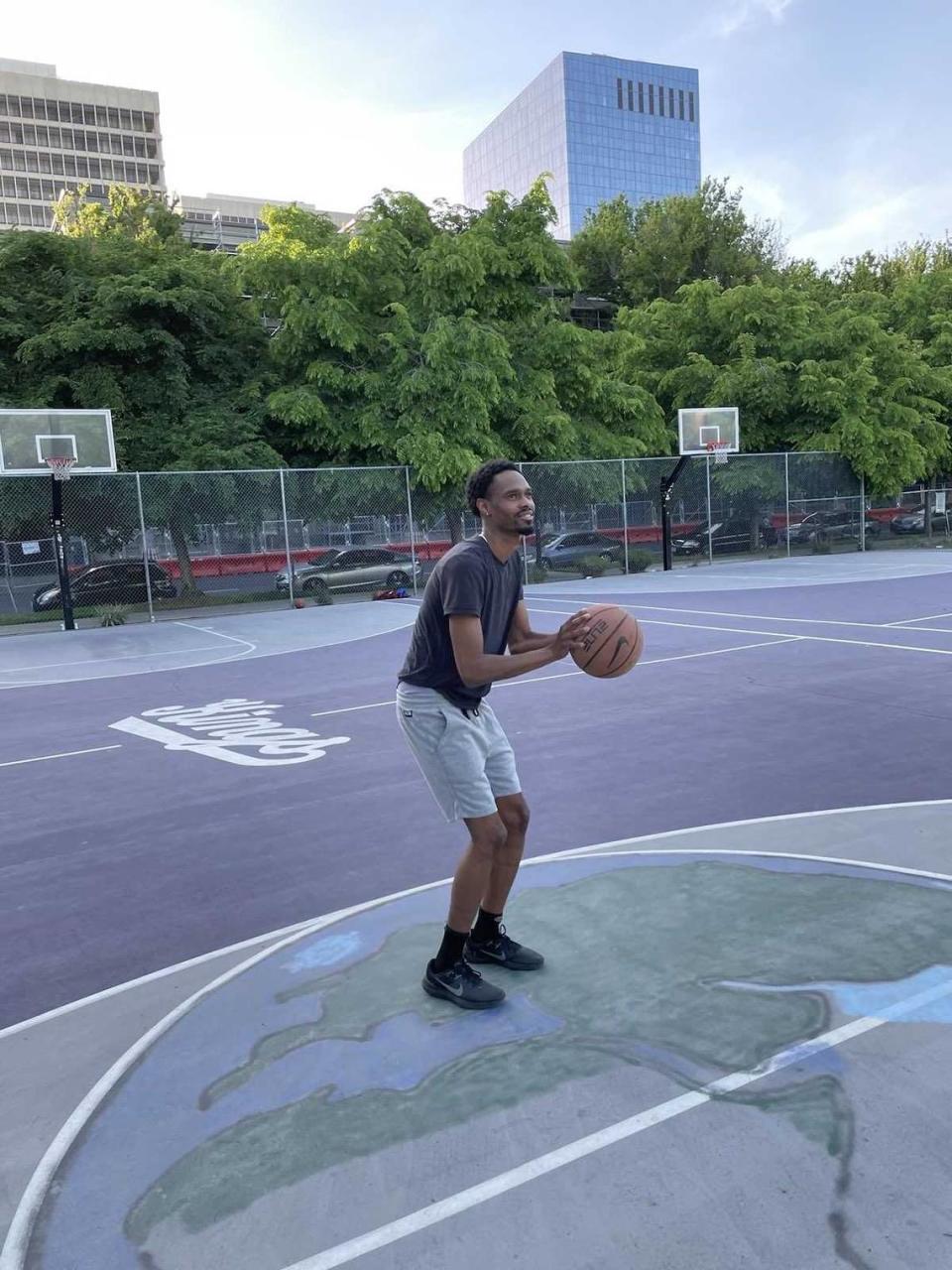 Ariston Davis shoots hoops at Roosevelt Park in downtown Sacramento on Monday, April 24, 2023. Davis, a resident of the Pocket, says that the Kings have renewed pride in Sacramento.