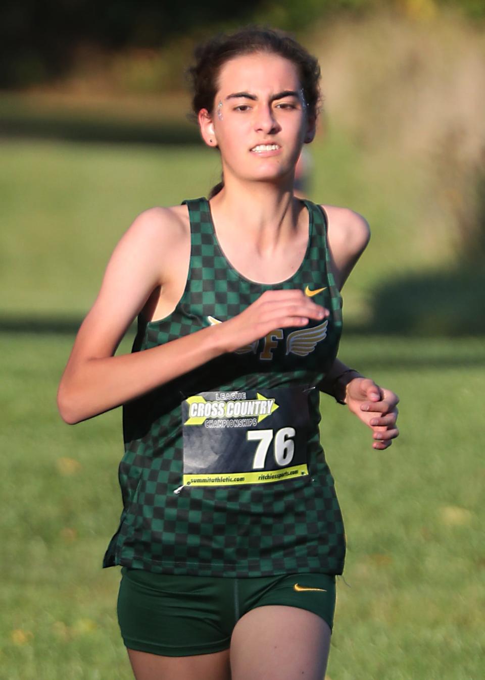 Firestone's Kathryn Miller finishes third in the City Series cross country championship at Goodyear Heights Metro Park, Wednesday, Oct. 11, 2023.