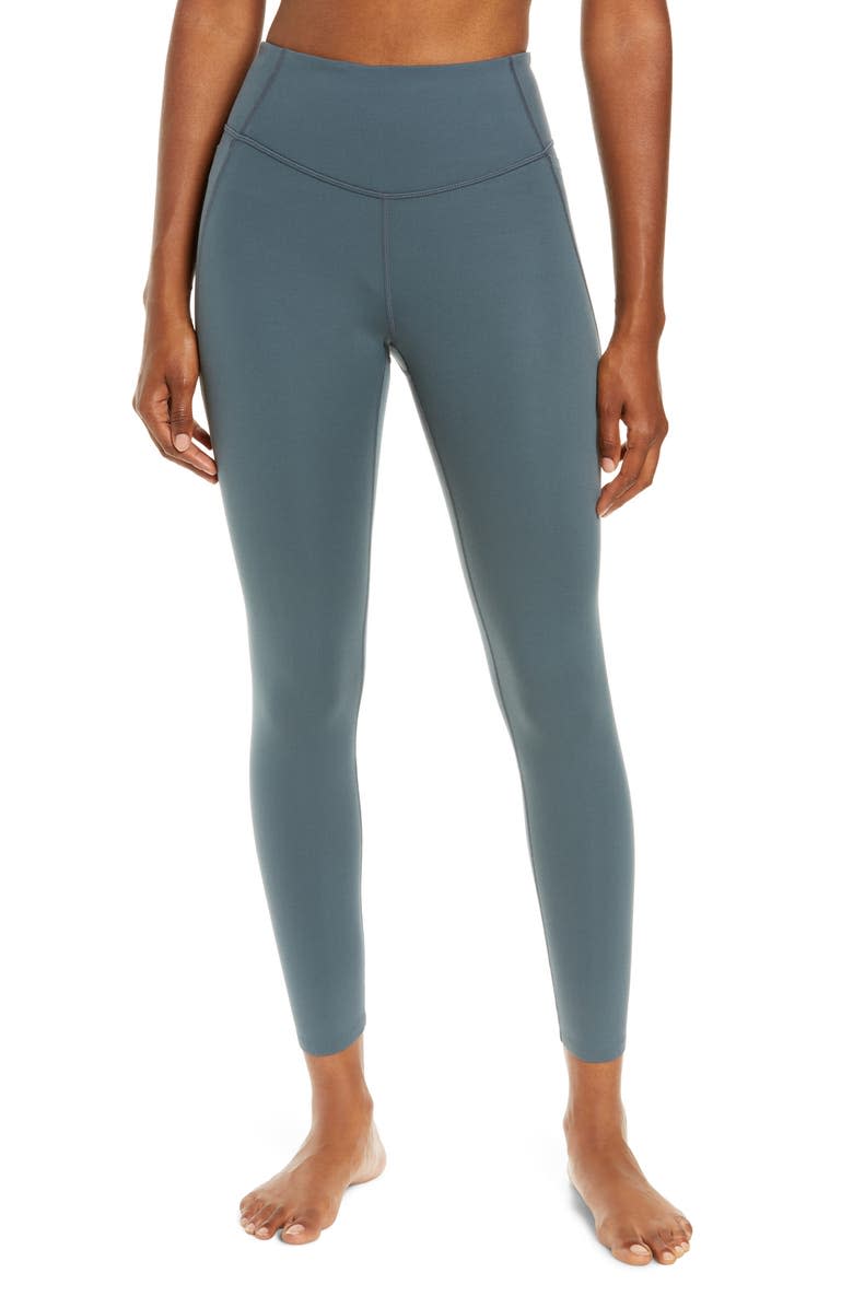 Zella High Waist Studio Lite Pocket 7/8 Leggings in Blue Slate. Image via Nordstrom.