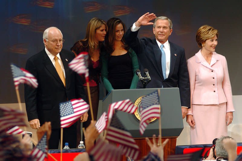 President George W. Bush, along with his family and Vice President Richard Cheney, delivers his 2004 election victory speech at the Reagan Building in Washington, D.C., on November 3, 2004. File Photo by Greg Whitesell/UPI