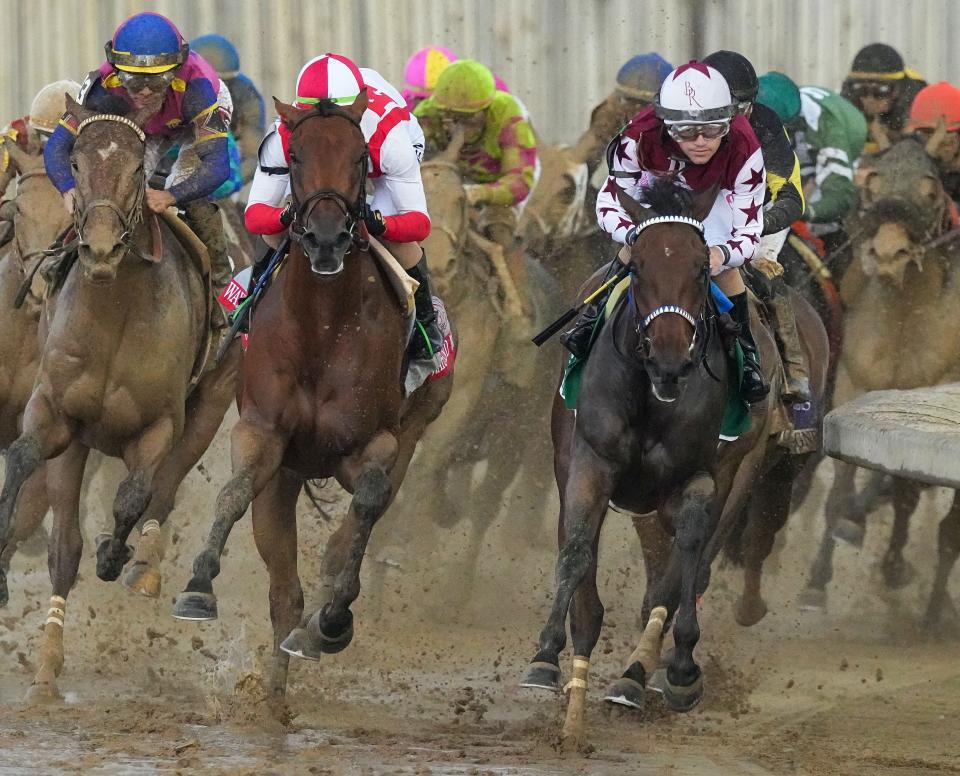 Ways And Means ridden by Tyler Gaffalione (front left) and Thorpedo Anna ridden by Brian J. Hernandez Jr. ride through the final turn Friday, May 3, 2024, during the 150th running of the Kentucky Oaks at Churchill Downs in Louisville, Kentucky. Thorpedo Anna ridden by Brian J. Hernandez Jr. wins the Kentucky Oaks.