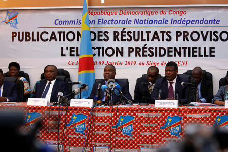 Members of Congo's Independent National Electoral Commission (CENI) attend a press conference announcing the results of the presidential election in Kinshasa, Democratic Republic of Congo, January 10, 2019. REUTERS/Jackson Njehia