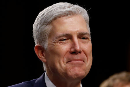 FILE PHOTO: U.S. Supreme Court nominee judge Neil Gorsuch sits for a third day of his Senate Judiciary Committee confirmation hearing on Capitol Hill in Washington, U.S. on March 22, 2017. REUTERS/Jonathan Ernst/File Photo