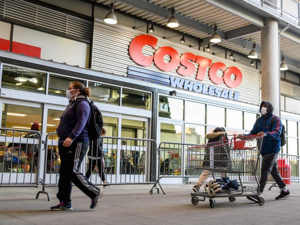 Costco shoppers outside one of its stores