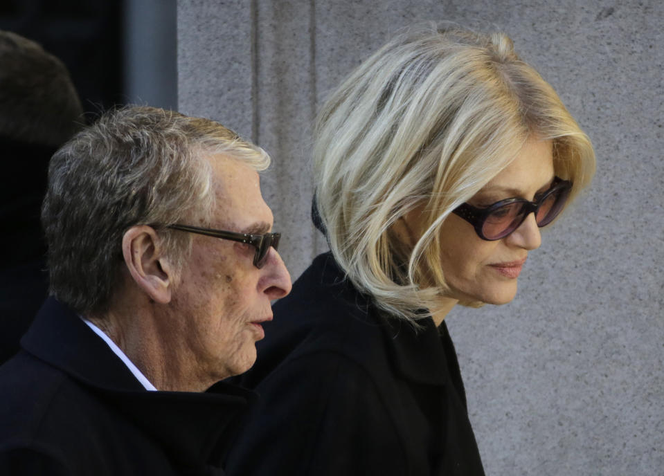 Director Mike Nichols, left, and Diane Sawyer arrive for the funeral of actor Philip Seymour Hoffman at the Church of St. Ignatius Loyola, Friday, Feb. 7, 2014 in New York. Hoffman, 46, was found dead Sunday of an apparent heroin overdose. (AP Photo/Mark Lennihan)