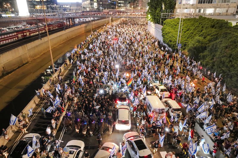 An aerial view shows protesters blocking Tel Aviv's main access road during a demonstration after Tel Aviv police chief quit citing government meddling against anti-government protesters