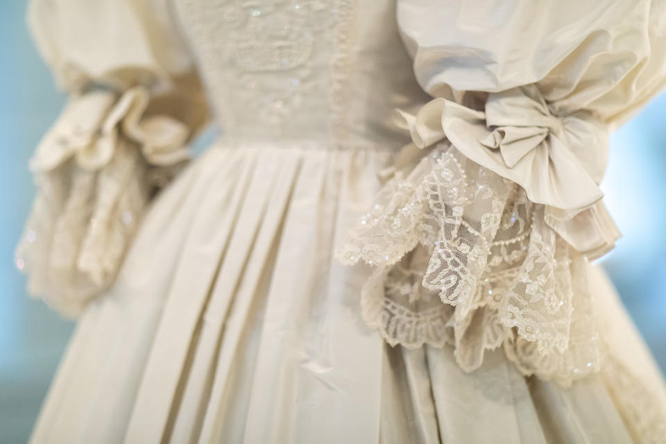 LONDON, ENGLAND - JUNE 02: Detail of Diana, Princess of Wales’s wedding dress displayed complete with its spectacular sequin encrusted train during the 