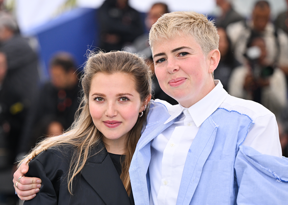 Mia McKenna-Bruce and Molly Manning Walker pose for press at Cannes.