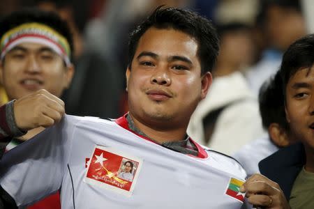 A portrait of Myanmar's National League for Democracy party leader Aung San Suu Kyi is seen on the shirt of a supporter during the World Cup qualifying soccer match between South Korea and Myanmar at the Suwon World Cup stadium in Suwon, South Korea, November 12, 2015. REUTERS/Kim Hong-Ji
