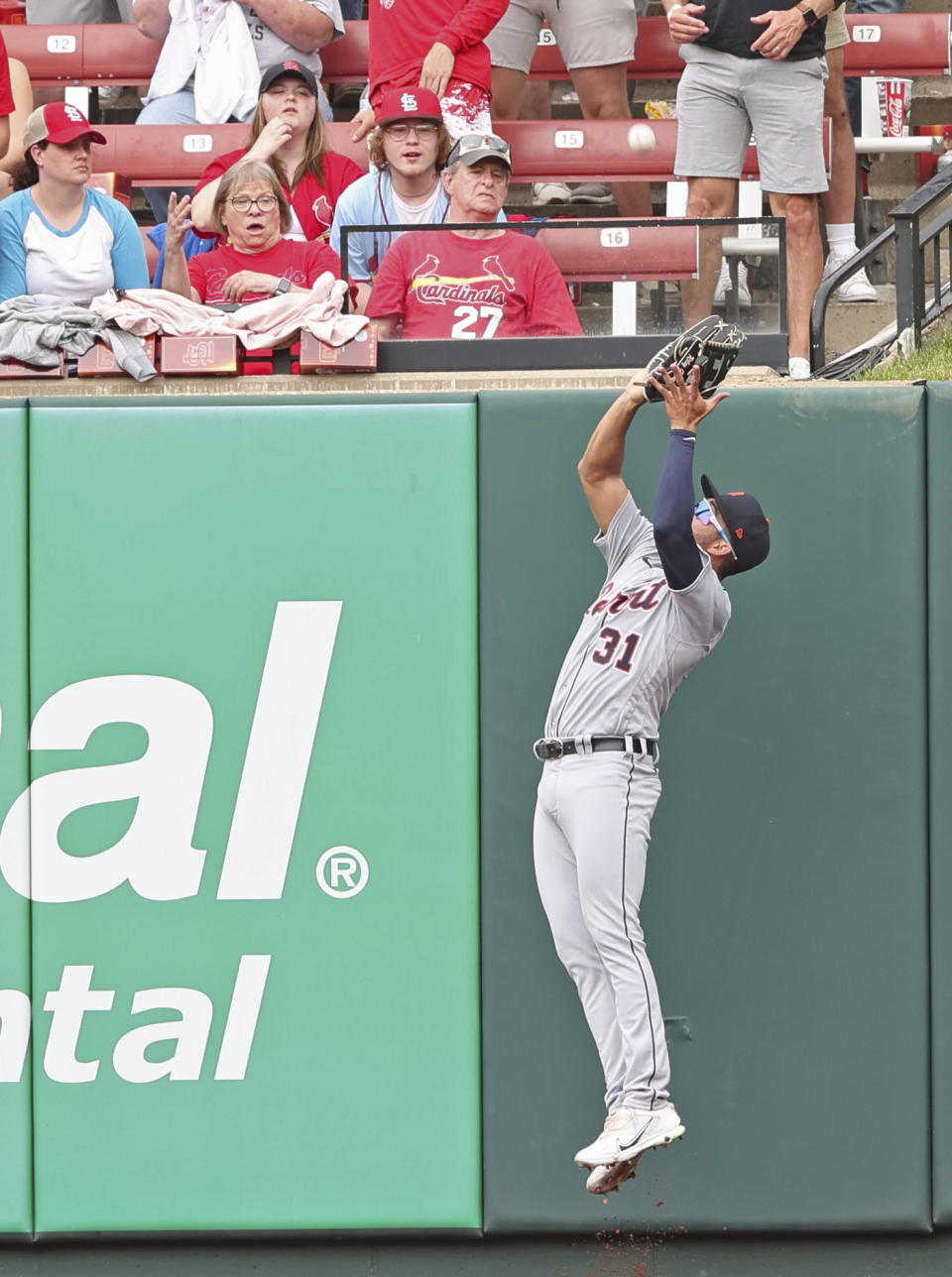 Detroit Tigers center fielder Riley Greene leaps at the wall to catch a long fly ball hit by St. Louis Cardinals' Andrew Knizner in the fourth inning of a baseball game, Saturday, May 6, 2023 in St. Louis. (AP Photo/Tom Gannam)