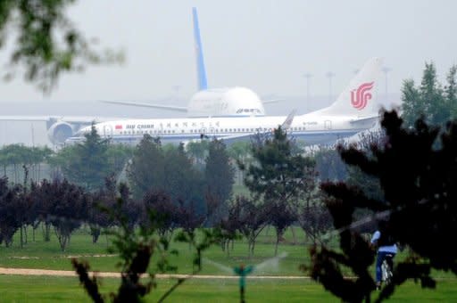 A China Southern Airline plane and an Air China plane are seen taxiing for take-off at the Beijing Capital International airport, on June 7. The debt crisis in Europe and high oil prices weigh on the outlook for airlines as they meet from June 10 in Beijing for the annual meeting of the International Air Transport Association (IATA)