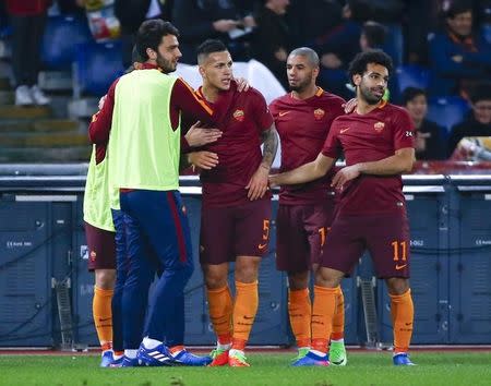 Football Soccer - AS Roma v Torino - Italian Serie A - Olympic stadium, Rome, Italy - 19/02/17 - AS Roma's Leandro Paredes celebrates with teammates after scoring against Torino. REUTERS/Tony Gentile