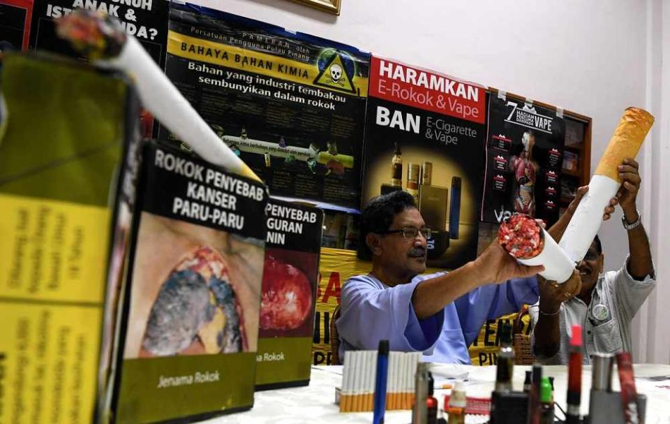 A CAP education officer during a press conference on May 30. — Bernama pic