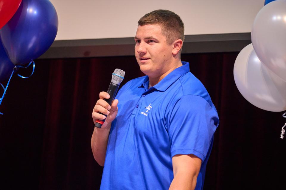 Griffin Stalfort, committed to Air Force Academy, gives a speech during the signing day ceremony at the Hamilton High School auditorium on Dec. 21, 2022, in Chandler.