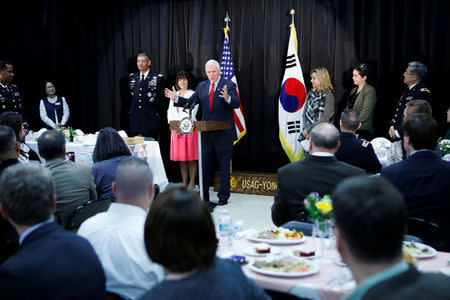 U.S. Vice President Mike Pence speaks during an Easter fellowship dinner at a military base in Seoul, South Korea, April 16, 2017. REUTERS/Kim Hong-Ji