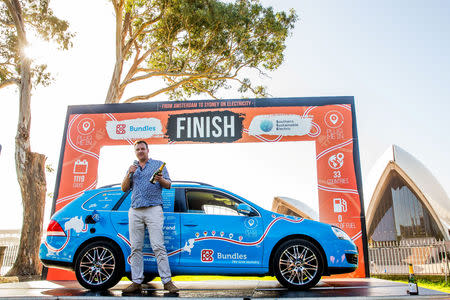 Dutch adventurer Wiebe Wakker finishes his three-year electric car journey from the Netherlands to Australia, in Sydney, Australia April 7, 2019Êin this picture obtained from social media. WIEBE WAKKER/PLUG ME IN PROJECT/via REUTERS