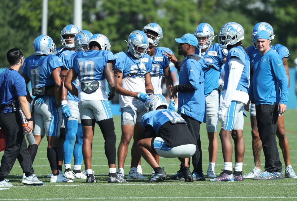 Lions receivers wait for the next drill to start during the Lions' joint practice with the Jaguars on Wednesday, Aug. 16, 2023, in Allen Park.