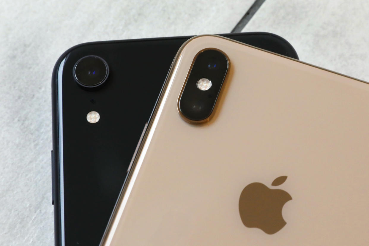 FILE- This Oct. 22, 2018, file photo shows the iPhone XR, left, that has a single lens, and the iPhone XS Max that has two lenses, in New York. Wall Street expects that Apple's latest quarterly snapshot will show mixed results. Financial analysts predict the technology giant's fiscal first-quarter earnings rose from a year earlier, while revenue declined. Apple serves up its results for the October-December quarter on Tuesday, Jan. 29. (AP Photo/Richard Drew, File)