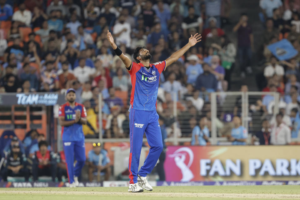 Delhi Capitals' Khaleel Ahmed celebrates the wicket of Gujarat Titans' Mohit Sharma during the Indian Premier League cricket match between Delhi Capitals and Gujarat Titans in Ahmedabad, India, Wednesday, April 17, 2024. (AP Photo/Pravin Indrekar)